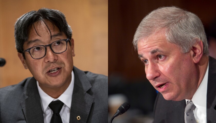 Comptroller of the Currency (OCC) Michael Chu (left), FDIC acting Chairman Martin Gruenberg